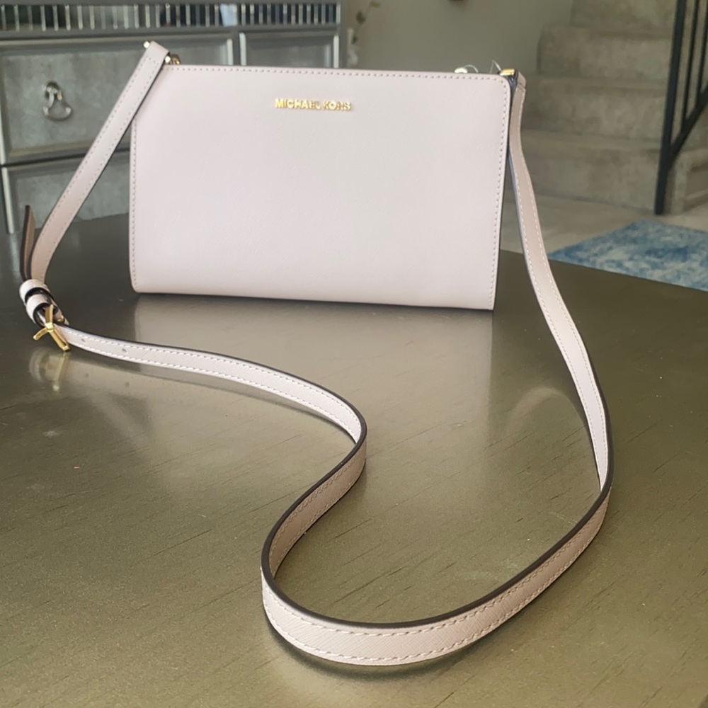 NWT Michael Kors jet set cross body leather clutch